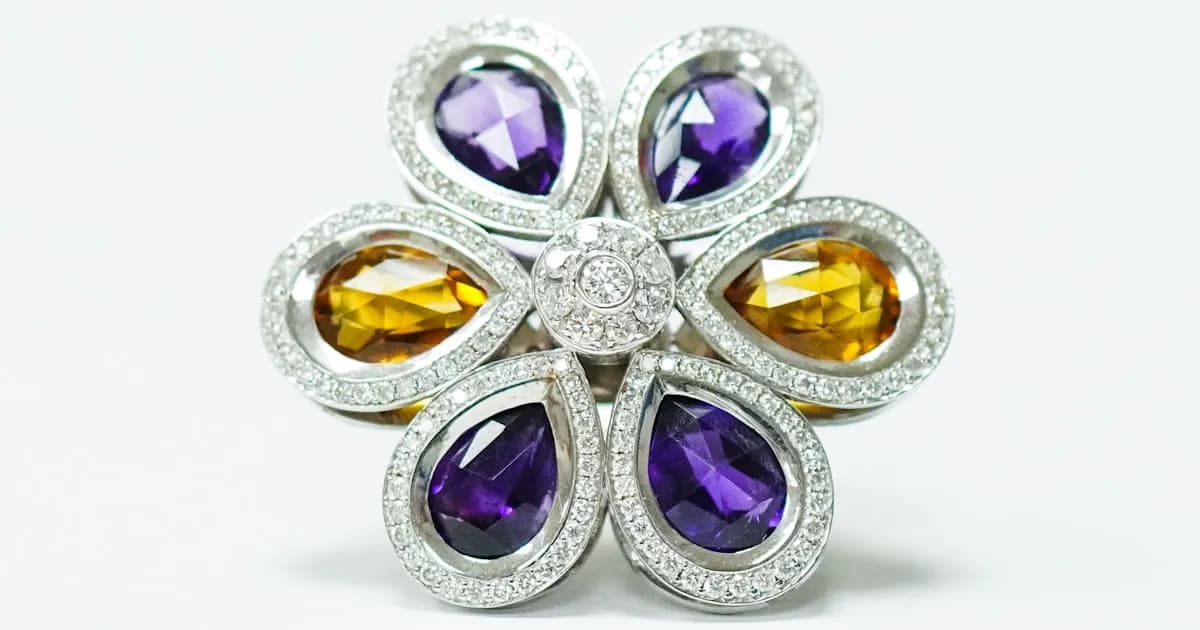 Jewelry pieces being examined with a magnifying glass